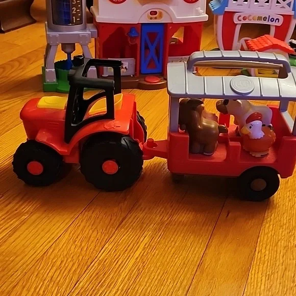Fisher price barn, little people tractor, and cocmelon barn - Picture 2 of 4